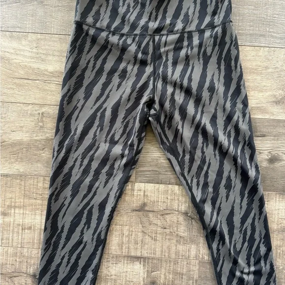 ZYIA Black and Gray Striped Light N Tight Leggings - Picture 1 of 3